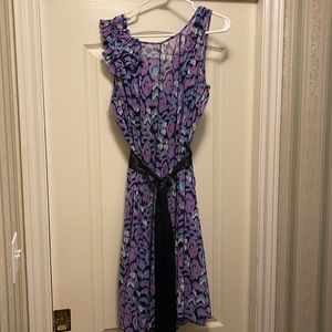 Mauve, blue , navy dress with full black “slip.” Black satin sash.